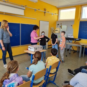 Unterrichtsbesuch einer blinden Person